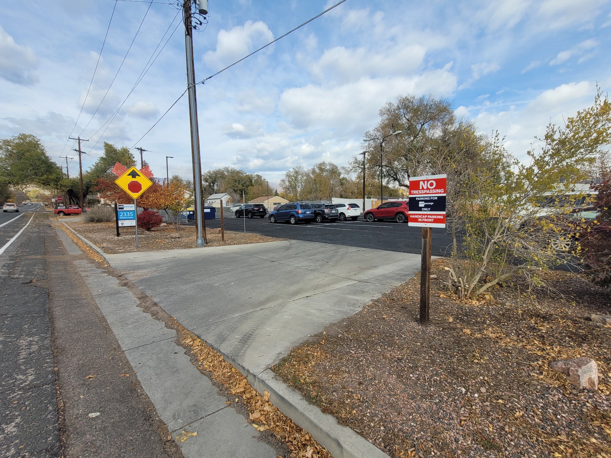 Entrance to parking lot in back of building, access off Bott Avenue